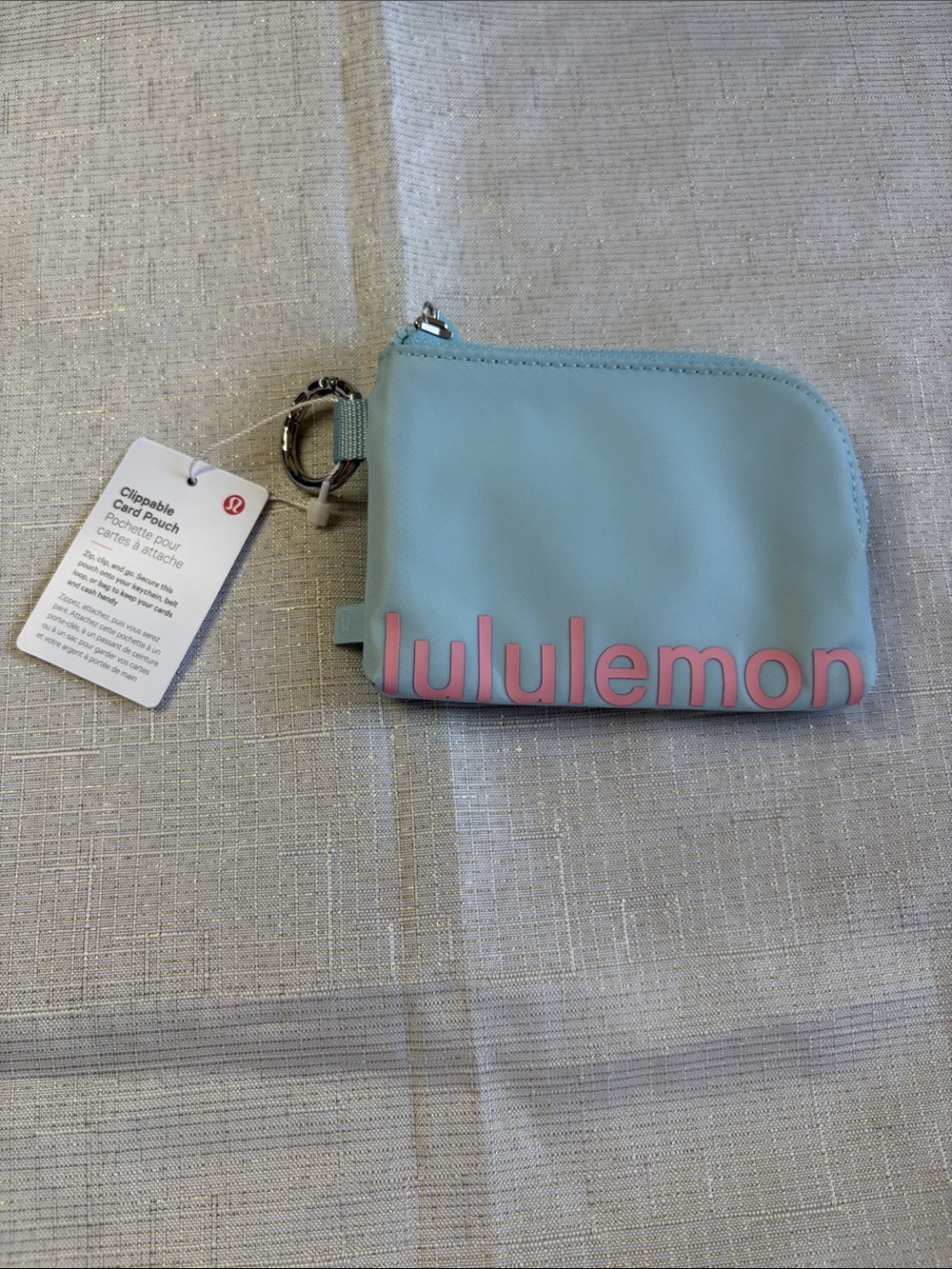 lululemon athletica Clipable Card Pouch in Light Blue with Pink Logo